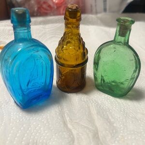 Set of Three Vintage Wheaton Avon Glass Bottles in Blue, Amber, and Green